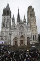 Small fire in towering spire of medieval cathedral in French city of Rouen is under control