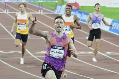 Warholm sets unofficial world record in 300m hurdles at Diamond League opener