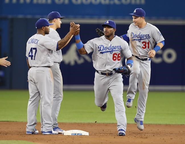 Jays hit Kershaw early, but Dodgers ace gets milestone win