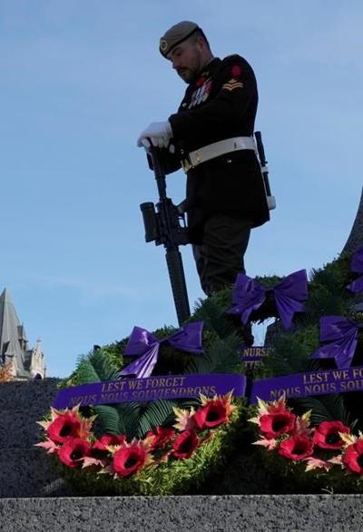 With masks and distancing, Canadians attend Remembrance Day ceremonies