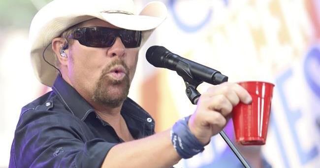 Fans raise a red Solo cup to honor Toby Keith, who immortalized the humble cup in song - Vimarsana News