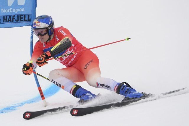 Swiss ski star Odermatt secures overall and GS World Cup titles in race won by teammate Meillard