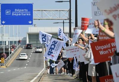 Passengers left in the lurch as Air Canada fleet grounded over labour strife