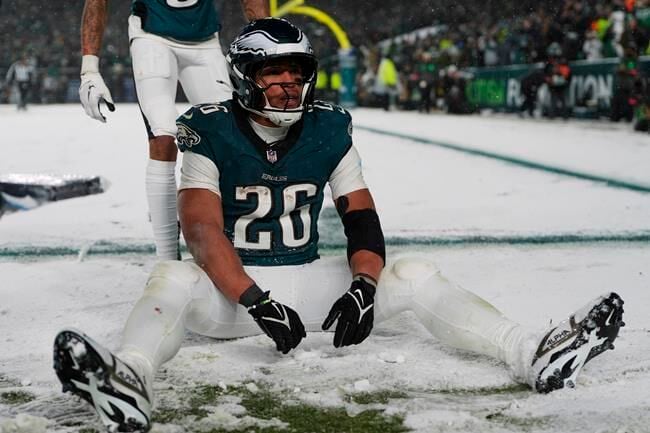 Barkley runs for 78- and 62-yard TDs in the snow and Eagles top Rams 28-22 to head to NFC title game