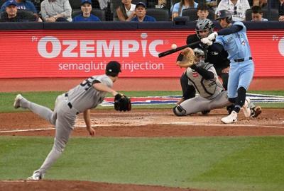 Bo Bichette's two-run homer caps Blue Jays' wild 8-4 win over rival Yankees
