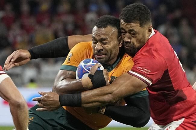 Wales qualifies for Rugby World Cup quarterfinals by crushing