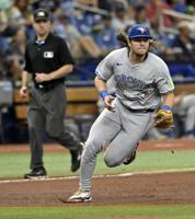 Barger's 'cannon' helps Jays lower the boom on Mariners