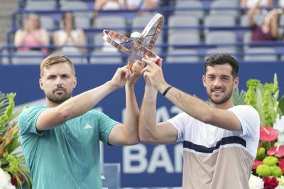 Cash and Glasspool save four match points en route to doubles title at NBO Toronto