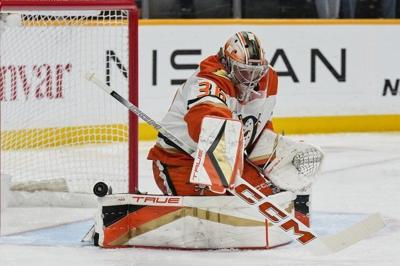 Red Wings acquire goalie John Gibson from the Ducks in a trade at the NHL draft