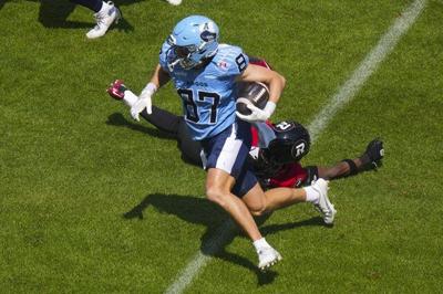 Brown throws five touchdown passes to lead Redblacks past Argos 46-42