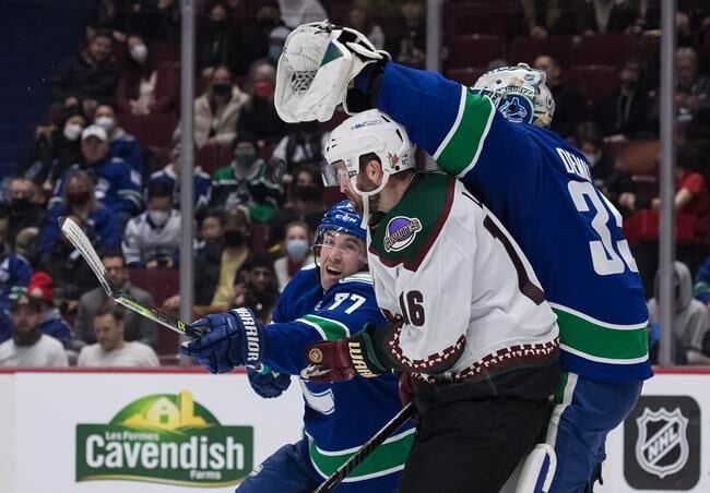 Canucks send package including No.9 pick to Coyotes for Ekman-Larsson,  Garland 