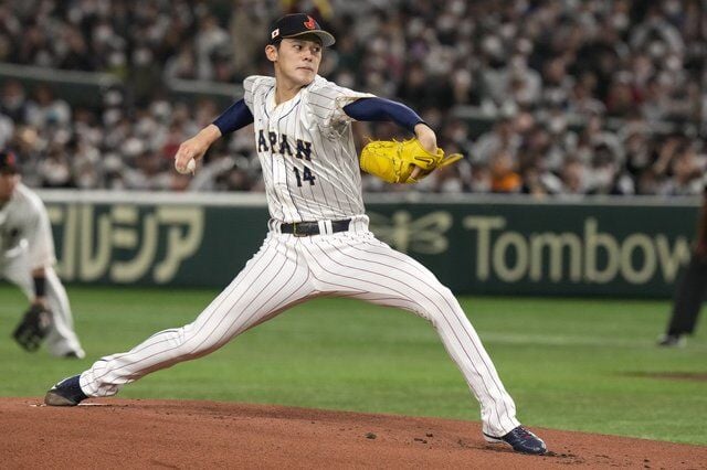 Prized Japanese pitcher Roki Sasaki says he intends to sign with Los Angeles Dodgers