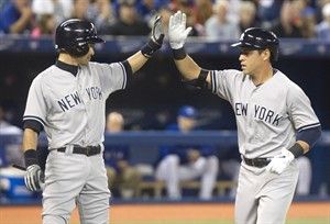 Yankees rough up White Sox, Buehrle