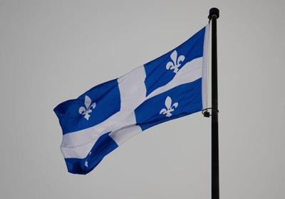 Quebec man who killed his young twins displayed domestic violence signs: coroner