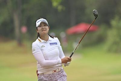 A Lim Kim leads LPGA tournament in Singapore by a stroke over Charley Hull after the first round