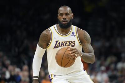 LeBron James 'Triple Logoman' card sells for $2.4 million