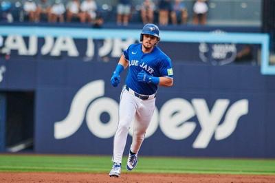 Blue Jays pull away late after squandering big lead to defeat Yankees 11-9