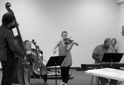 Chazz Gist, Rachel Schoenfeld, Hannah Karrick and Russell Thomas rehearse "Desperado" at The Plaza mall