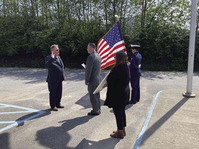 Jesse Kvale takes the postmaster’s oath