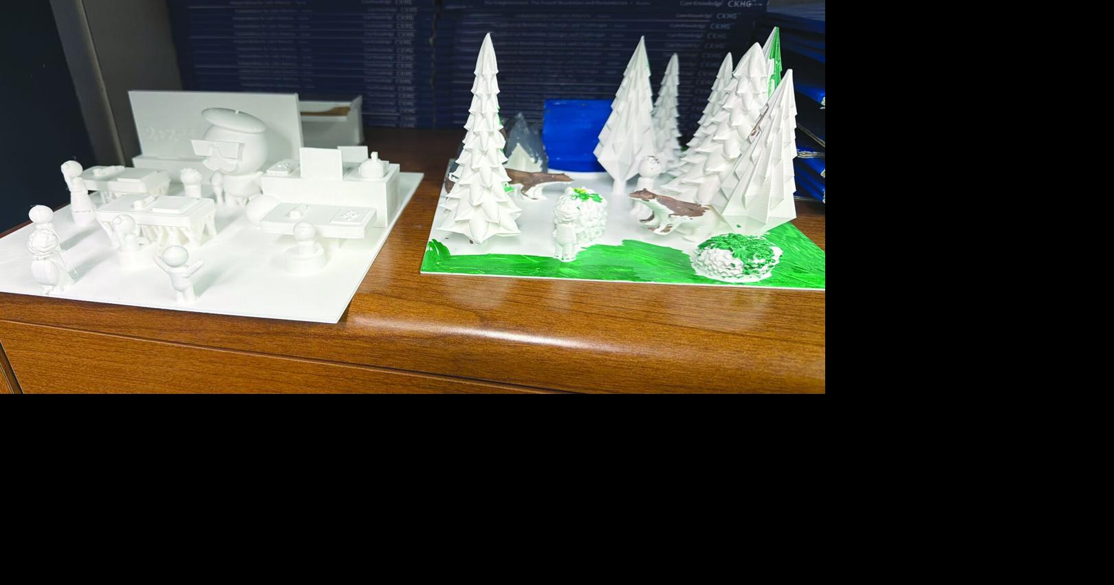 KCS students learning 3-D printing processes