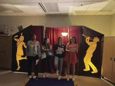 Mereane Iverson, Lilli Larna, Rylie Welk and Izzy Oliver read poetry