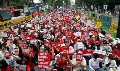 South Korean women protesting against spycam pornography in Seoul in 2018. Massive women's rights protests in the country have led to victories on issues ranging from abortion access to tougher penalties for spycam crimes