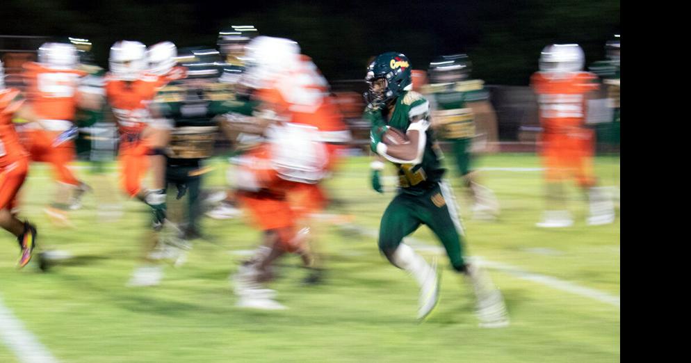 Despite missing quarterbacks, 'Canes score big in home finale Local