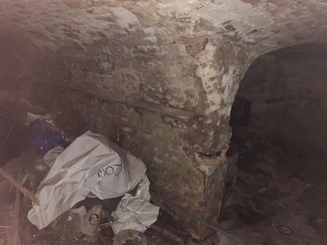 Shop owner discovers Victorian jail cells hidden in her basement ...
