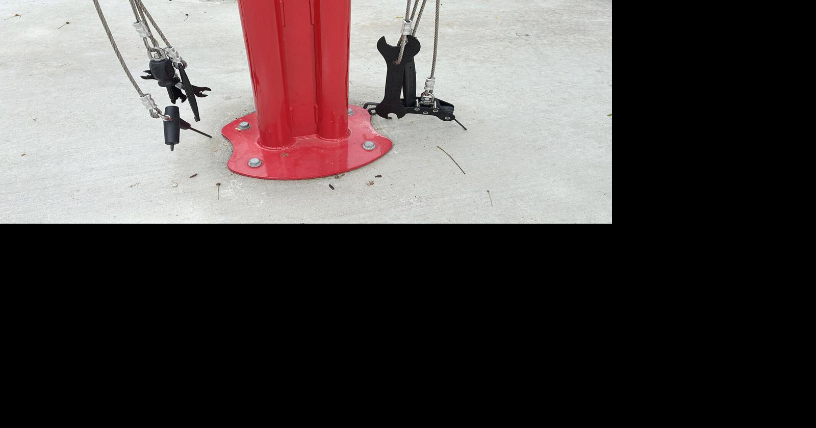Bike repair station at Founders Park close up of tools and wrenches  Jill Zima Borski photo  8015 8-28-26.jpeg