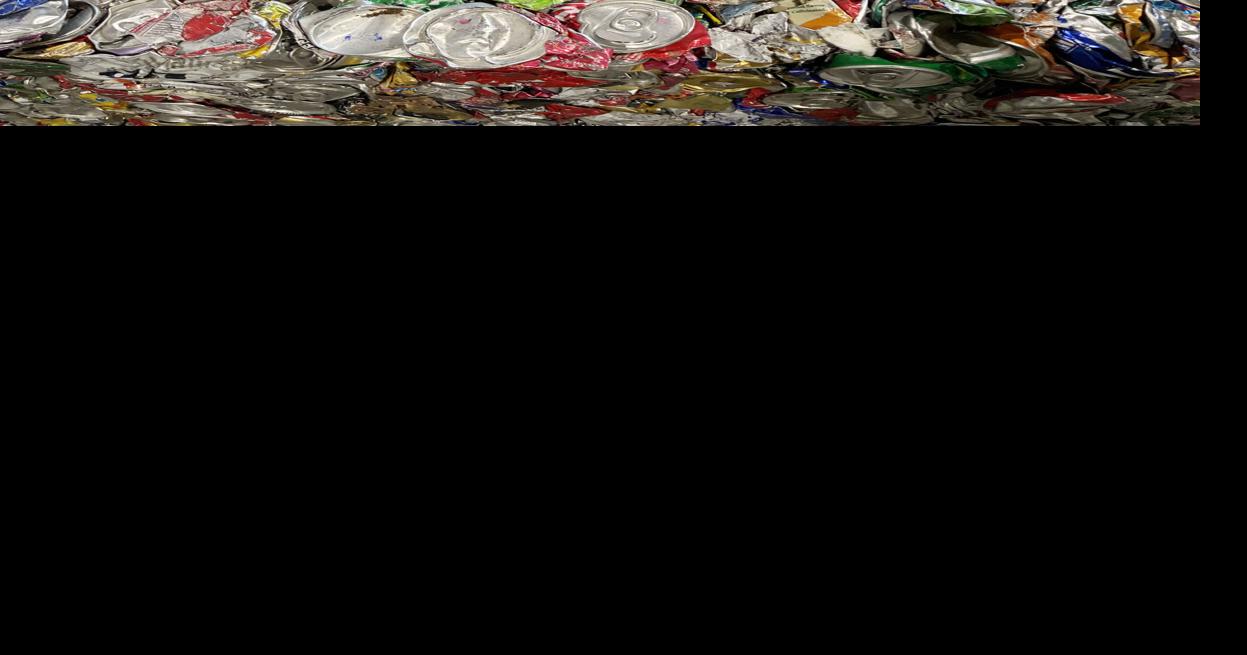 Aluminum cans get crushed and bailed into shippable units_7972 Jill Zima Borski 8-28-26 recycling visit at WM.jpeg