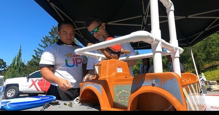 Kids with mobility impairments receive adaptive toy cars from Tigard