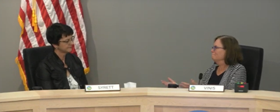 Eugene mayor Lucy Vinis bids farewell to councilor Claire Syrett after recall election