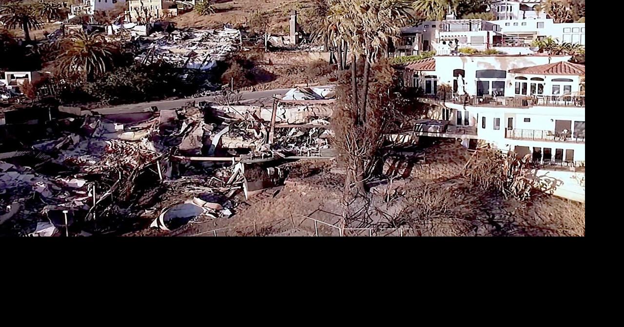 Over 50,000 under evacuation orders or warnings as wildfire imperils