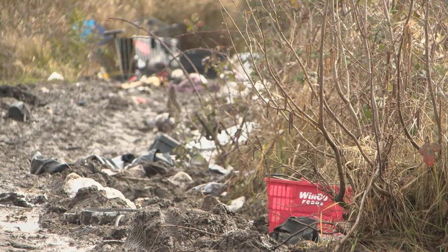 Clean up continues at trash filled lot near Danebo Ponds News kezi com