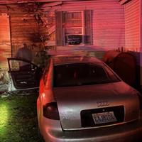 Car crashes into Courtland Avenue house, nearly starts fire