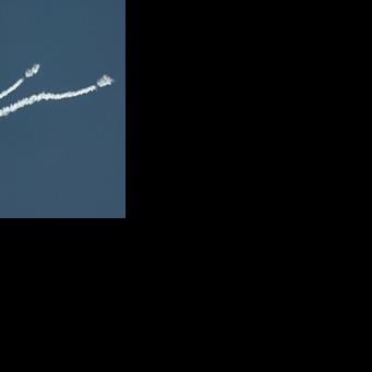 Smoke from a reported rocket interception is seen in the sky over Abu Dhabi