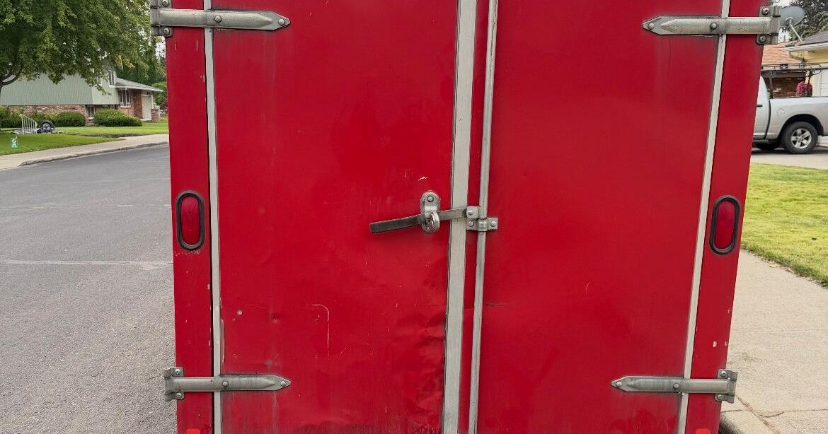 'It's kicking you while you're down.' Family displaced by Spokane fires victimized by theft as trailer, tools stolen