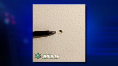 Bullet hole in apartment wall Spokane Valley