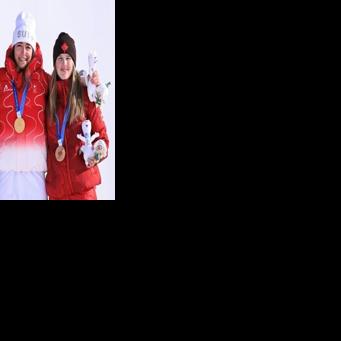 Freestyle skiing star Eileen Gu had to settle for Olympic silver after after losing to Switzerland's Mathilde Gremaud (C) in the slopestyle event while Megan Oldham (R) of Canada took bronze