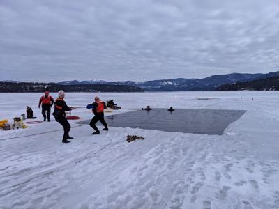 Crews pull car out of Hayden Lake following DUI crash