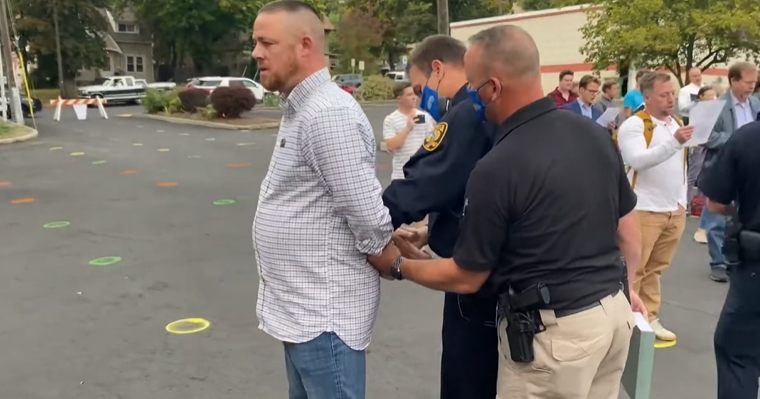 Gabriel Rench being arrested for resisting arrest after being cited for ...