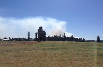 update brush fire off of cheney spangle road 100 contained news khq com brush fire off of cheney spangle road