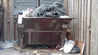 man held after 2 alabama children found in trash container news