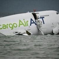 A cargo plane veered off the runway in Hong Kong, killing two people