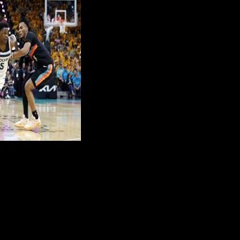 Minnesota's Anthony Edwards drives past San Antonio's Stephon Castle in the Timberwolves playoff upset
