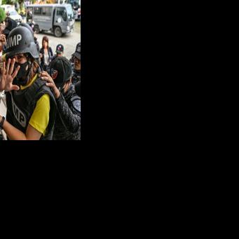 Filipino journalist Frenchie Mae Cumpio arrives Thursday at the regional court in Tacloban, where she was found guilty on terror financing charges