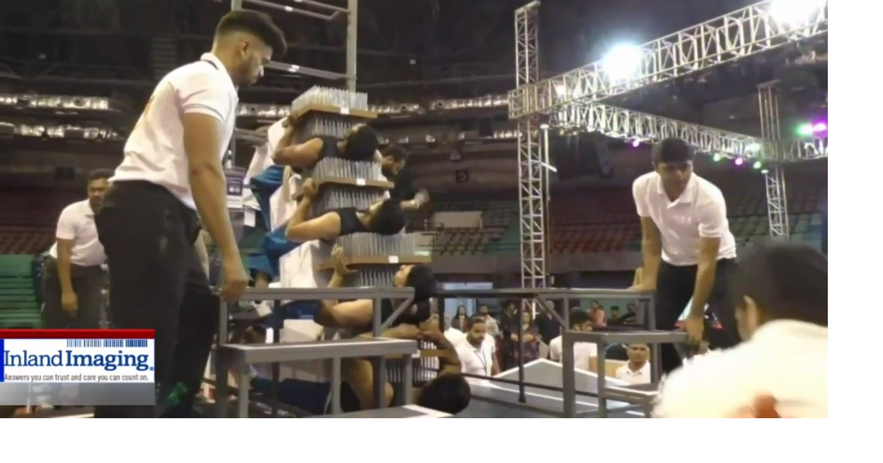 WOW! Daredevils set record for most layers in human bed of nails