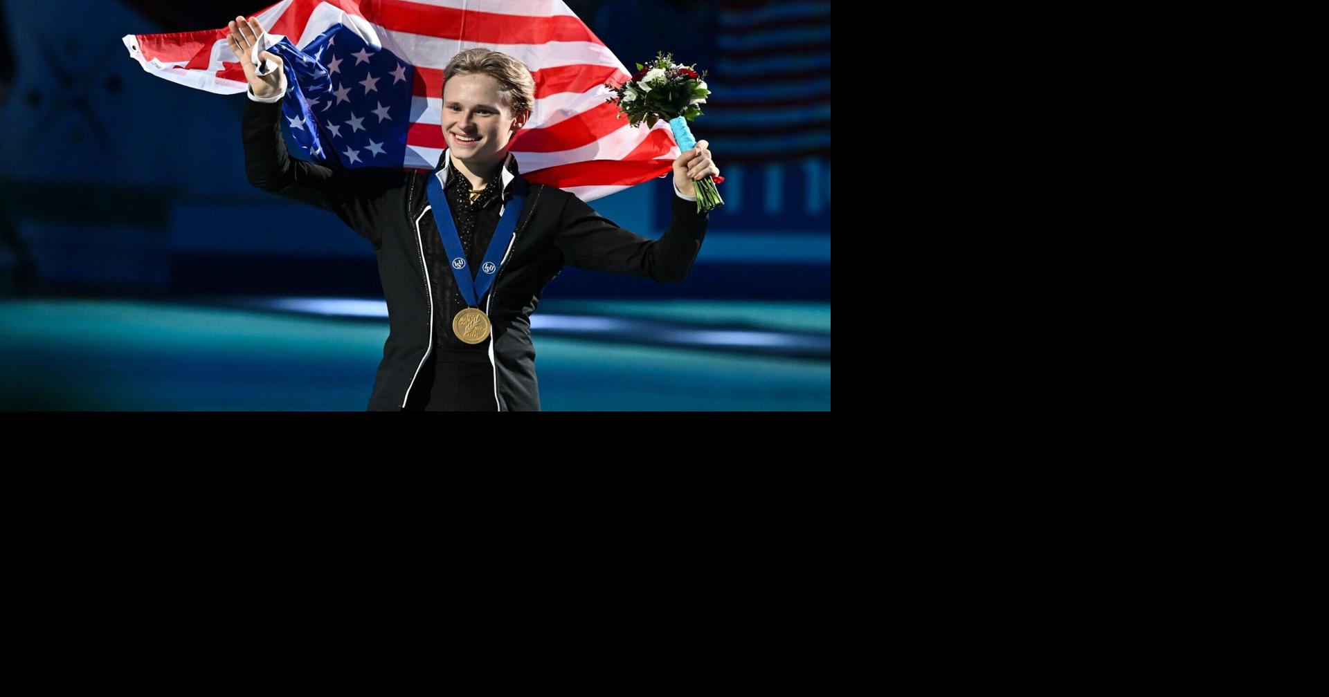 MONTREAL, CANADA - MARCH 23: Ilia Malinin of the United states of America carries the USA flag as he skates with his gold medal after competing in the Men's Free Program during the ISU World Figure Skating Championships at the Bell Centre on March 23,…