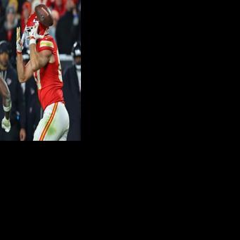 Azeez Al-Shaair of the Houston Texans intercepts a pass intended for Travis Kelce in the Texans' NFL victory over the Kansas City Chiefs