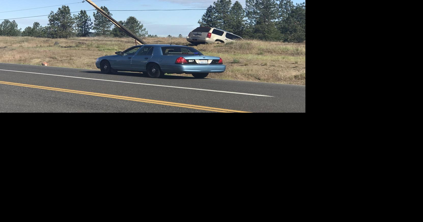 Driver hospitalized after crashing car into power pole in North Spokane ...